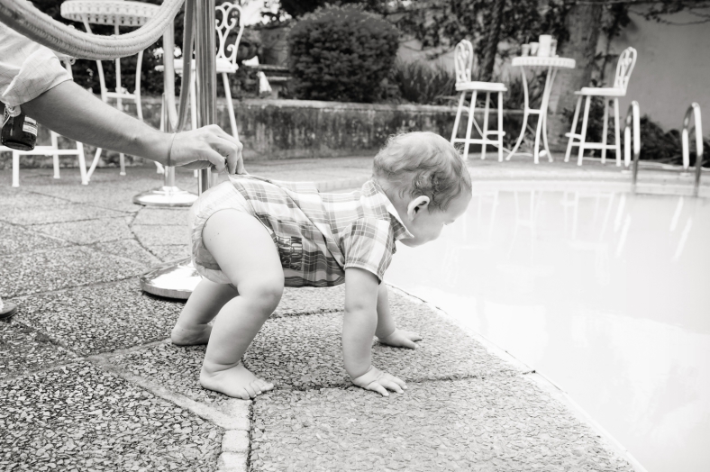 Baby by the pool