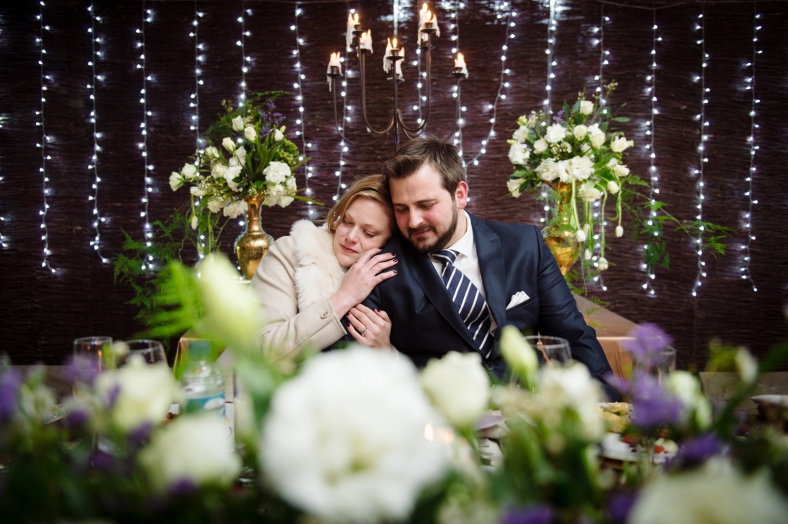 Bride and Groom leaning on each other