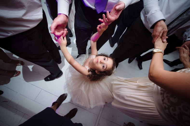 Girl dances at wedding