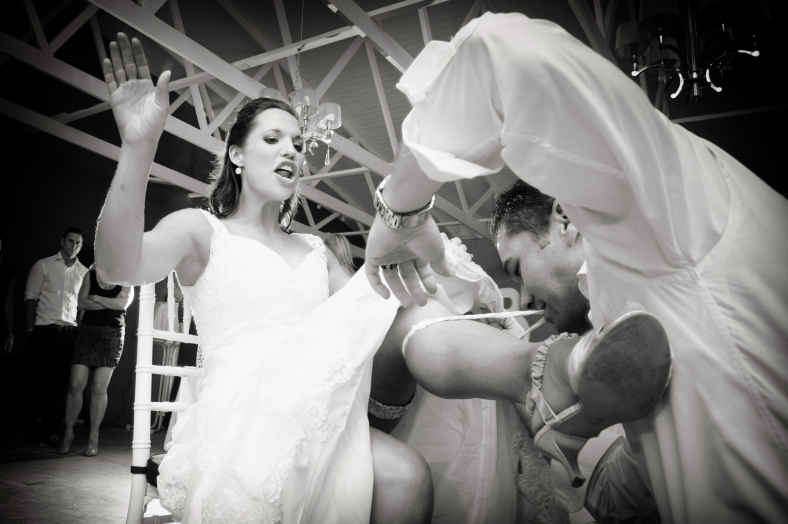 Groom taking more than garter