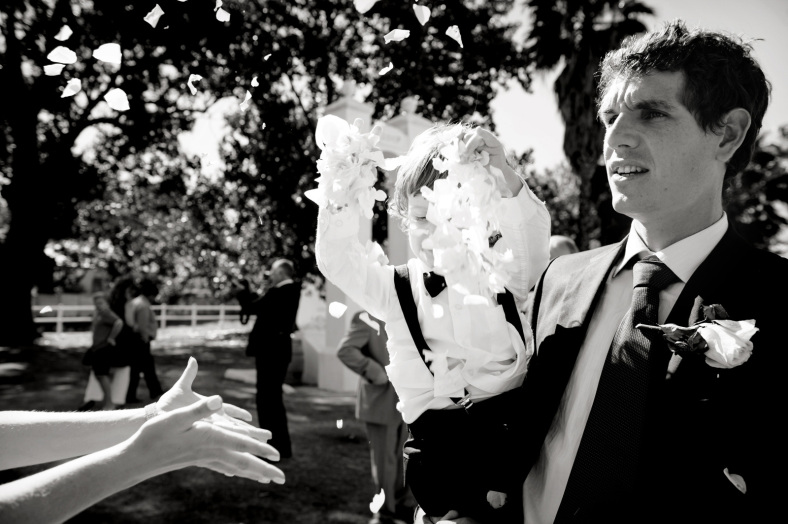 Child throws petals