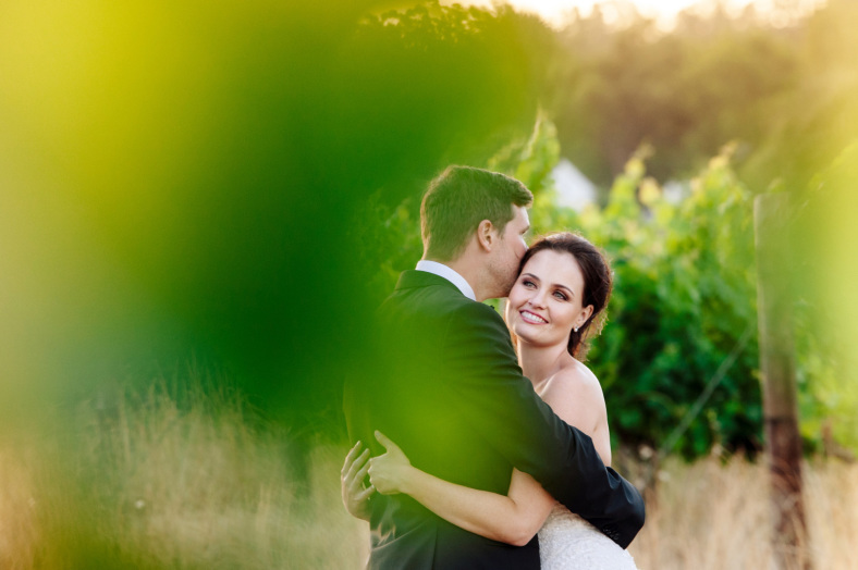 Bride and Groom in vineyard