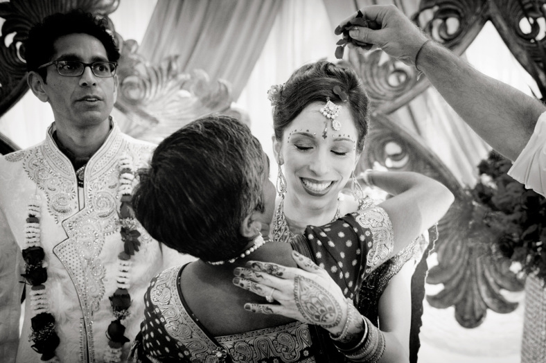 Bride hugs woman