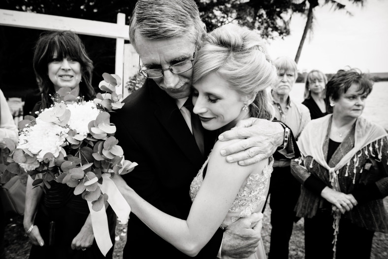 Father hugs daughter