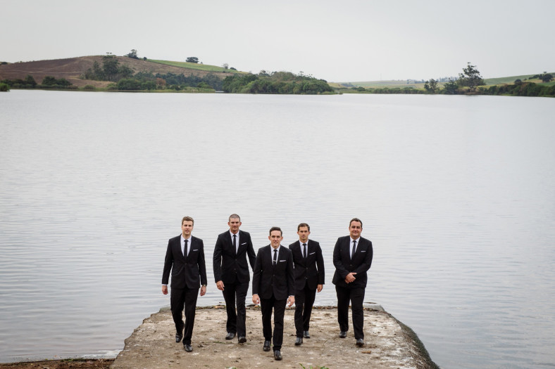Grooms men on water