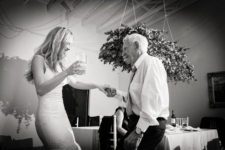Bride and grandfather dancing