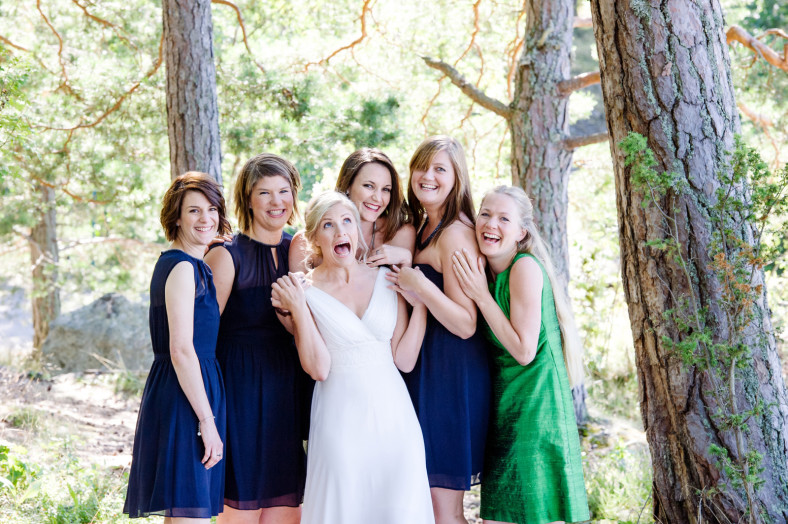 Bride and bridesmaids in the woods