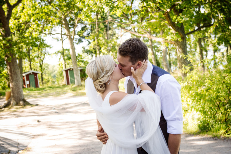 bride and groom kiss