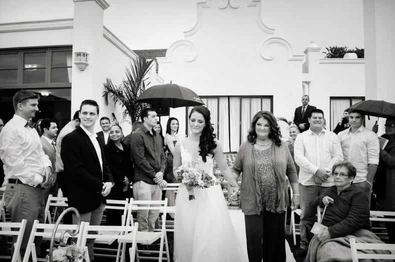 bride crying down the aisle
