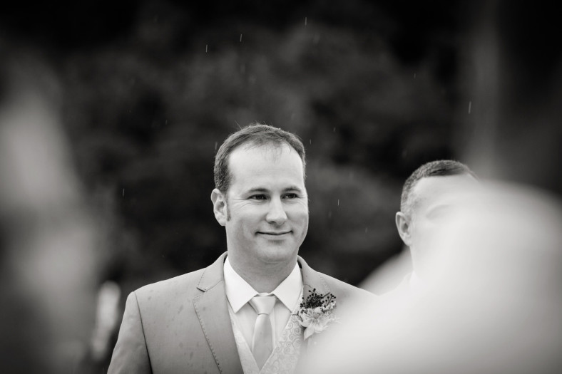 Groom in rain