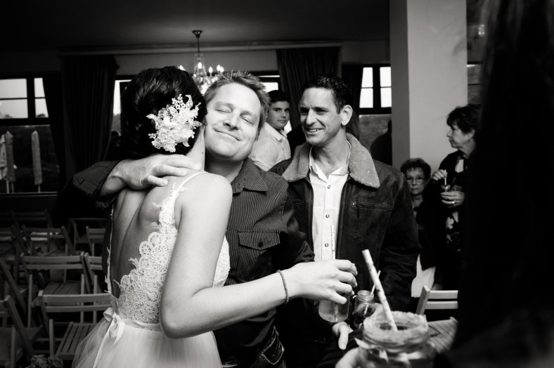 bride hugs friends