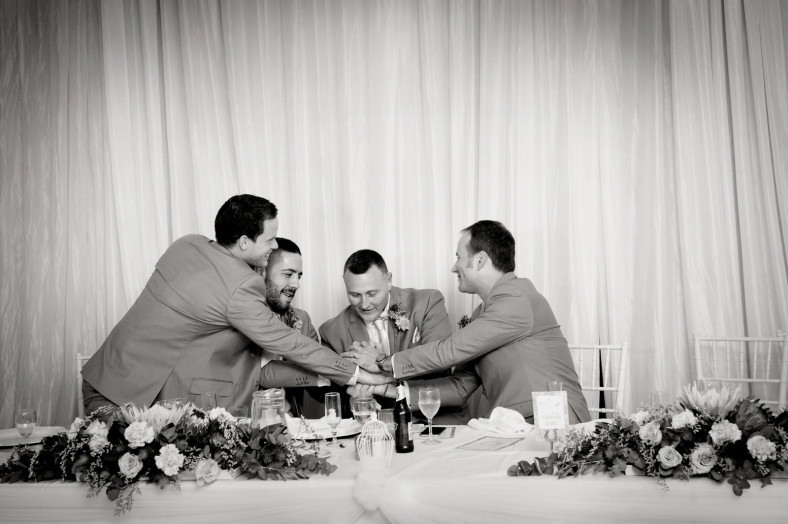 happy groomsmen