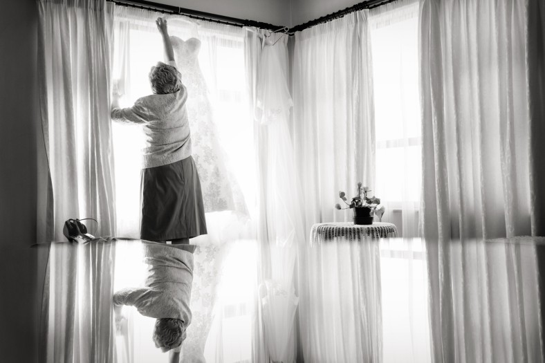 mom with wedding gown