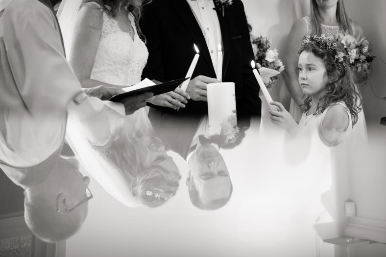 lighting candles wedding