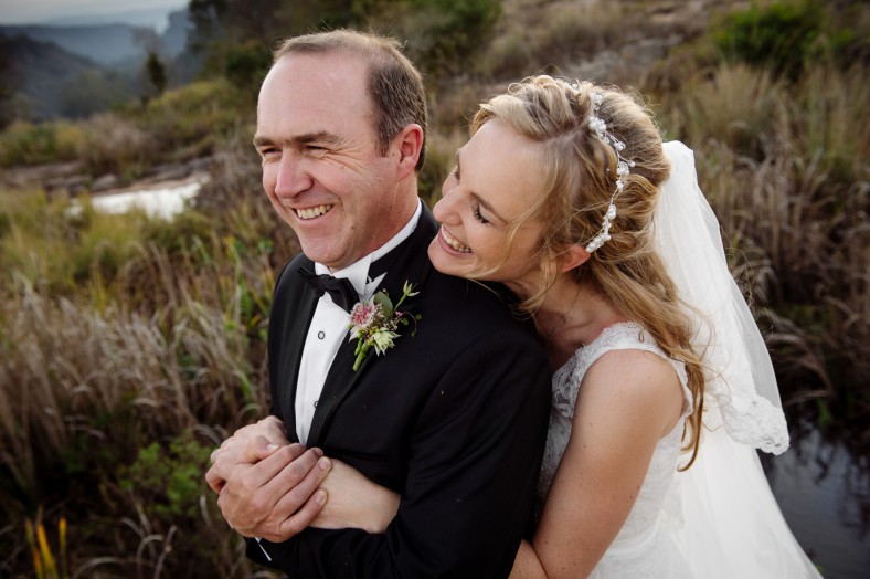 bride and groom happy