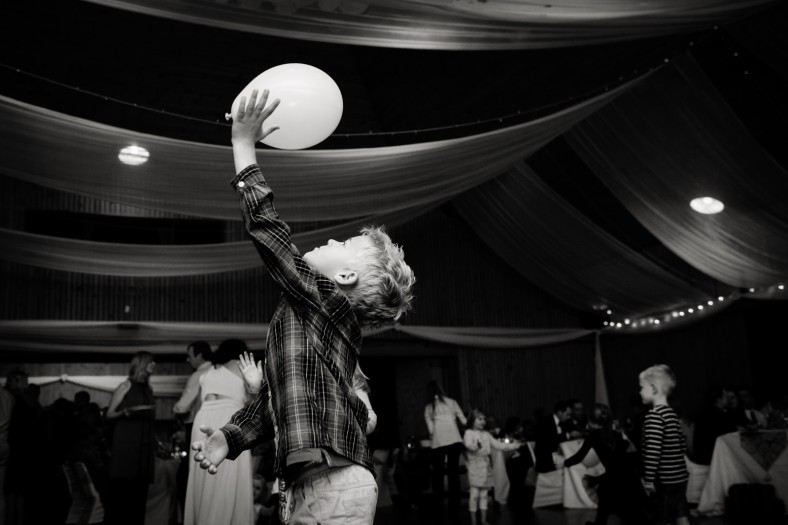 boy playing with a balloon