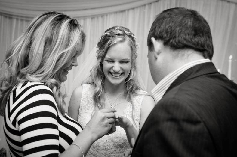 excited bride with wedding ring