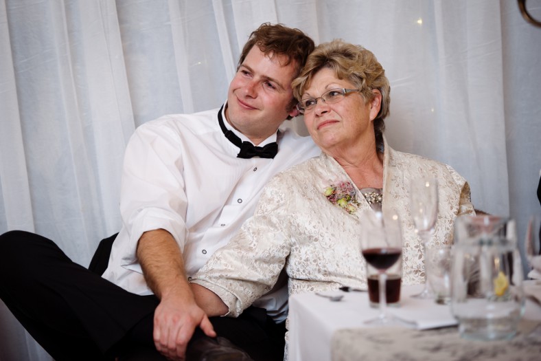 mom and son at wedding