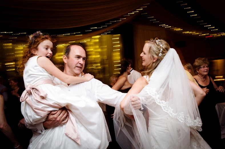 family dancing at wedding