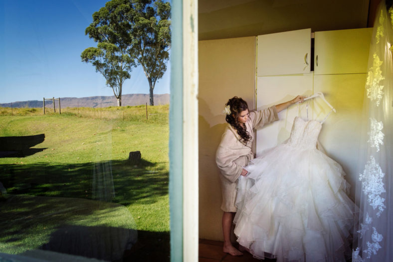 Bride with wedding dress in the country