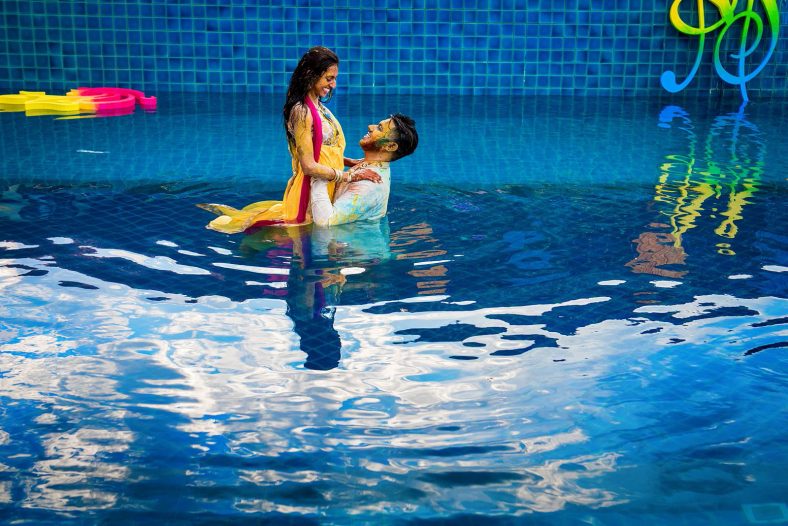 Hindu couple at fun Hurdee ceremony.