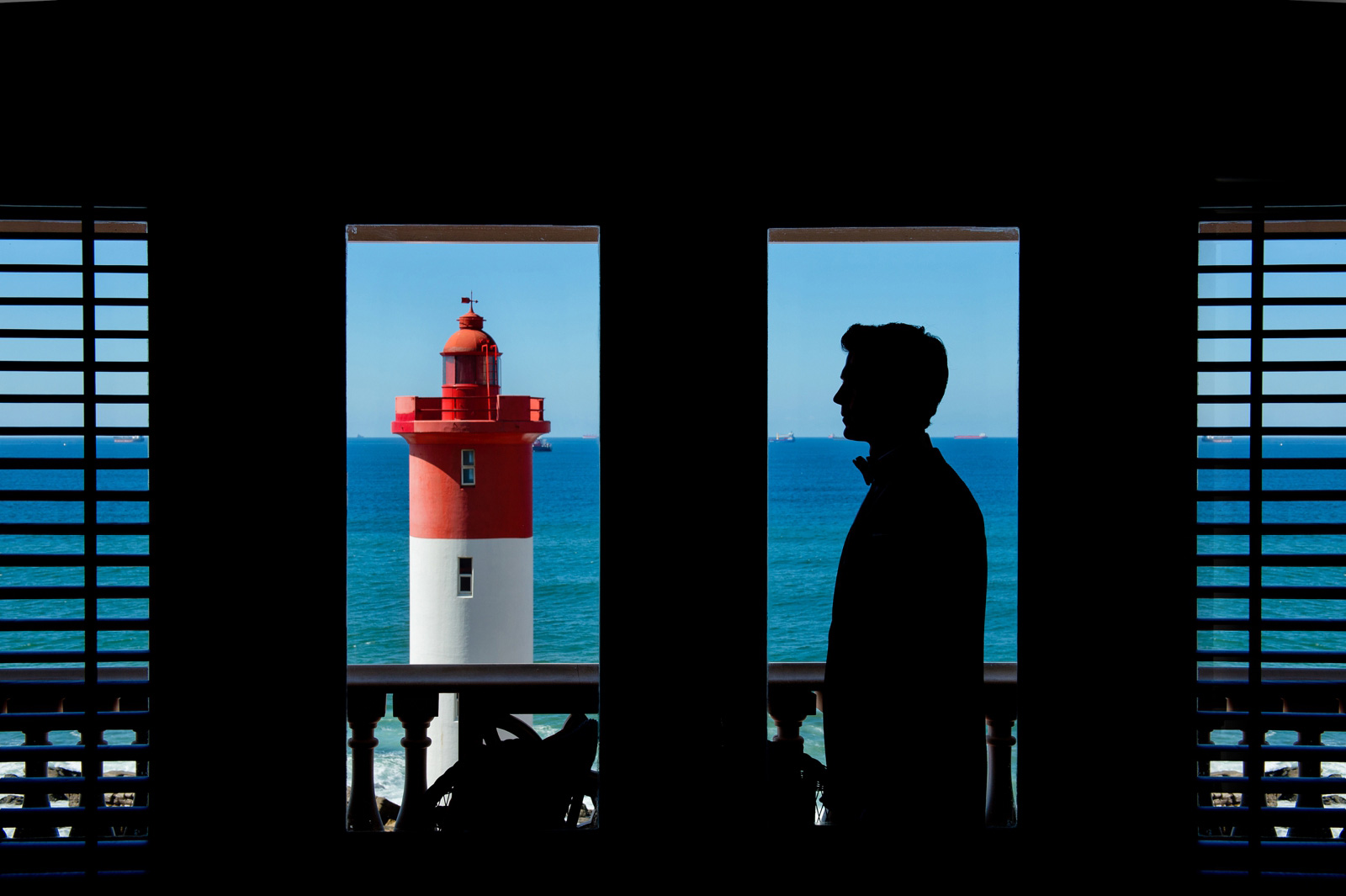 man and lighthouse