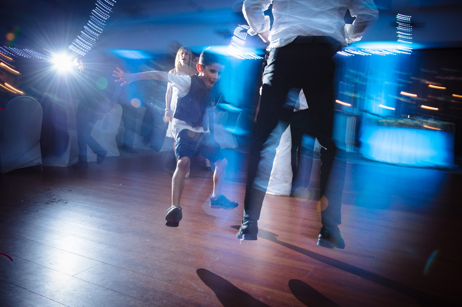 child dancing at wedding