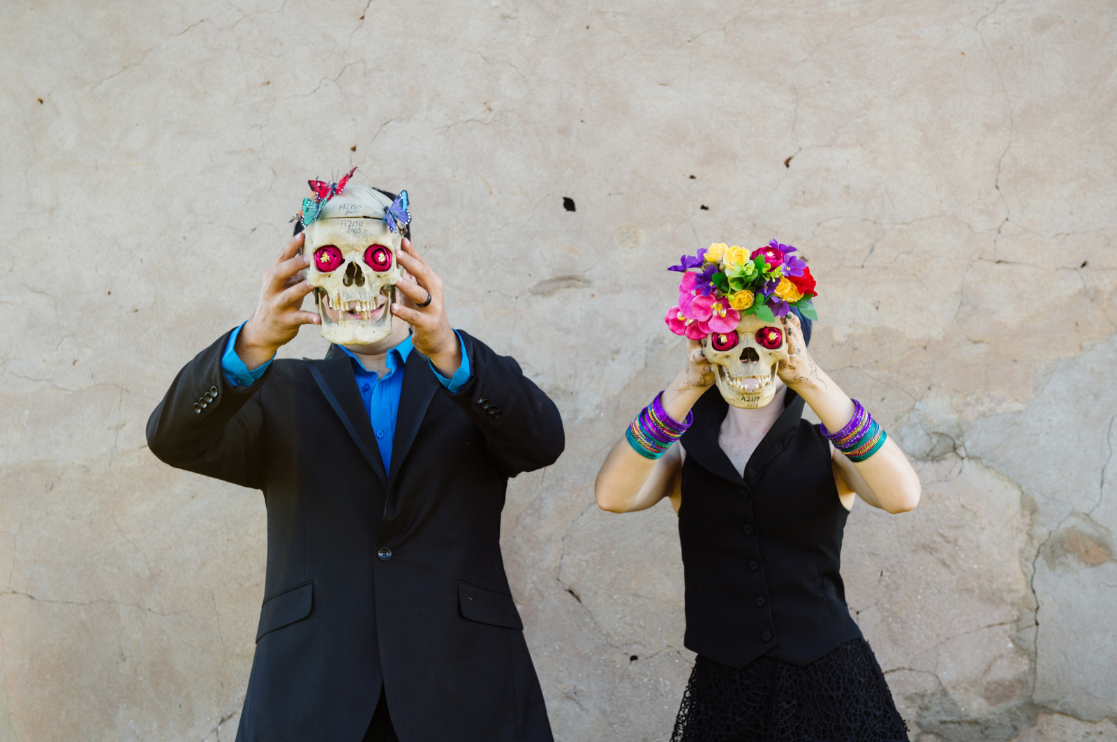 Bride and groom with skulls