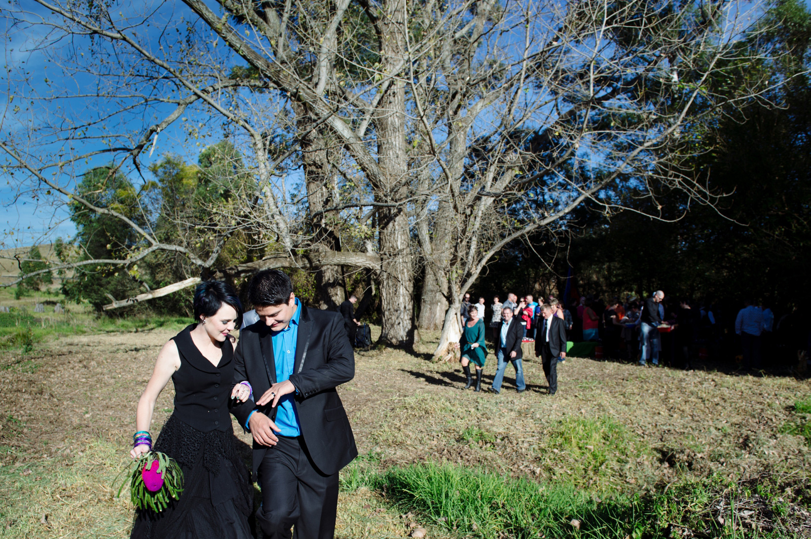groom and bride in black dress