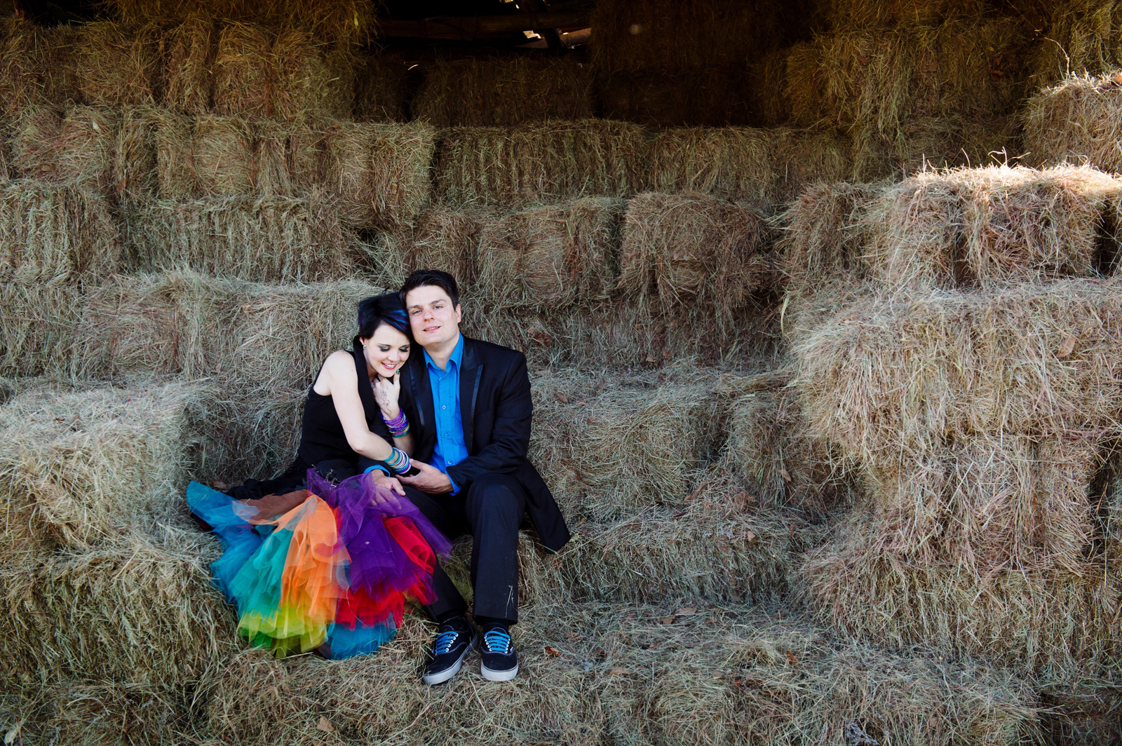 bride and groom on hay