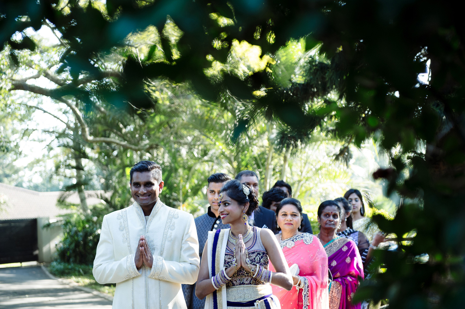 indian couple arrive at ceremony