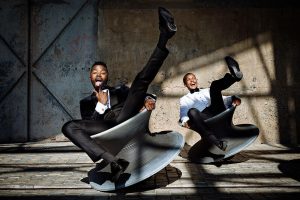 Fun wedding photo of two grooms at the Zeitz MOCCA Cape Town